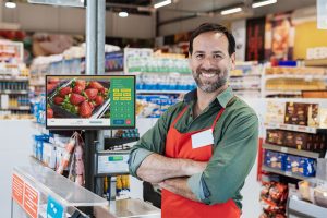 Shopping fresh groceries in modern supermarket in Latin America